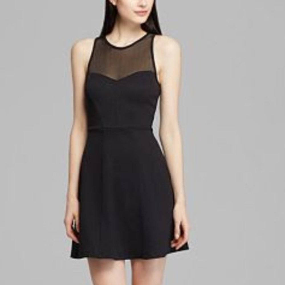 Black dress with sweet-hear neckline and mesh top